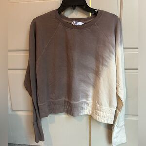 Brown and white pullover